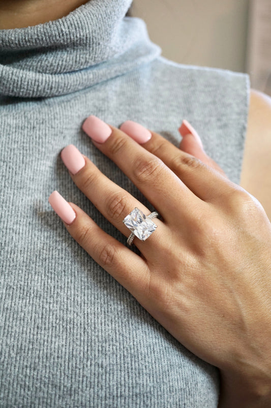 Stunning 5.0ct radiant cut moissanite engagement ring with three row pavé lab diamonds and hidden halo in solid gold setting - elizabeth + Bern