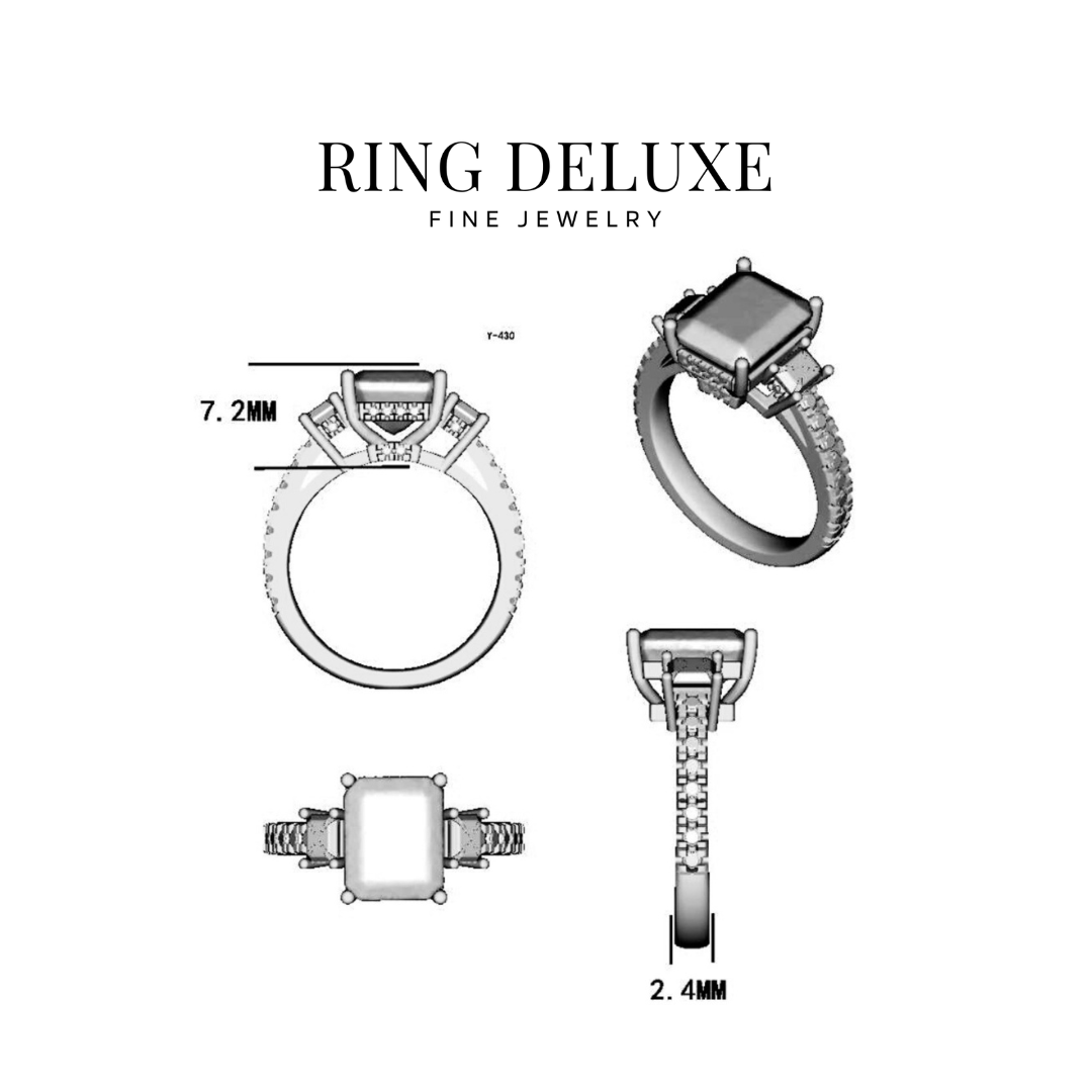 Three-stone emerald cut moissanite ring with side stones in luxury ring box- elizabeth + Bern