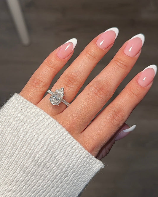 Elegant 4.0ct pear cut moissanite engagement ring with hidden halo and accent stones in 14K gold prong setting - elizabeth + Bern