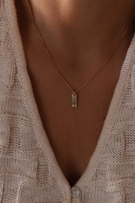 STAMPED INITIAL TAG CHARM - elizabeth + Bern