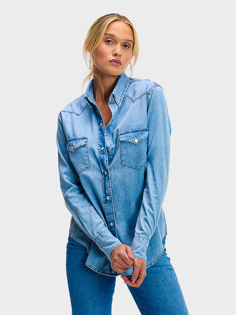Light blue denim shirt from sustainable women’s tops collection at Elizabeth and Bern - versatile work and casual wear