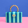 THE LOUISA Blue & Turquoise Stripe Woven Straw Clutch Bag