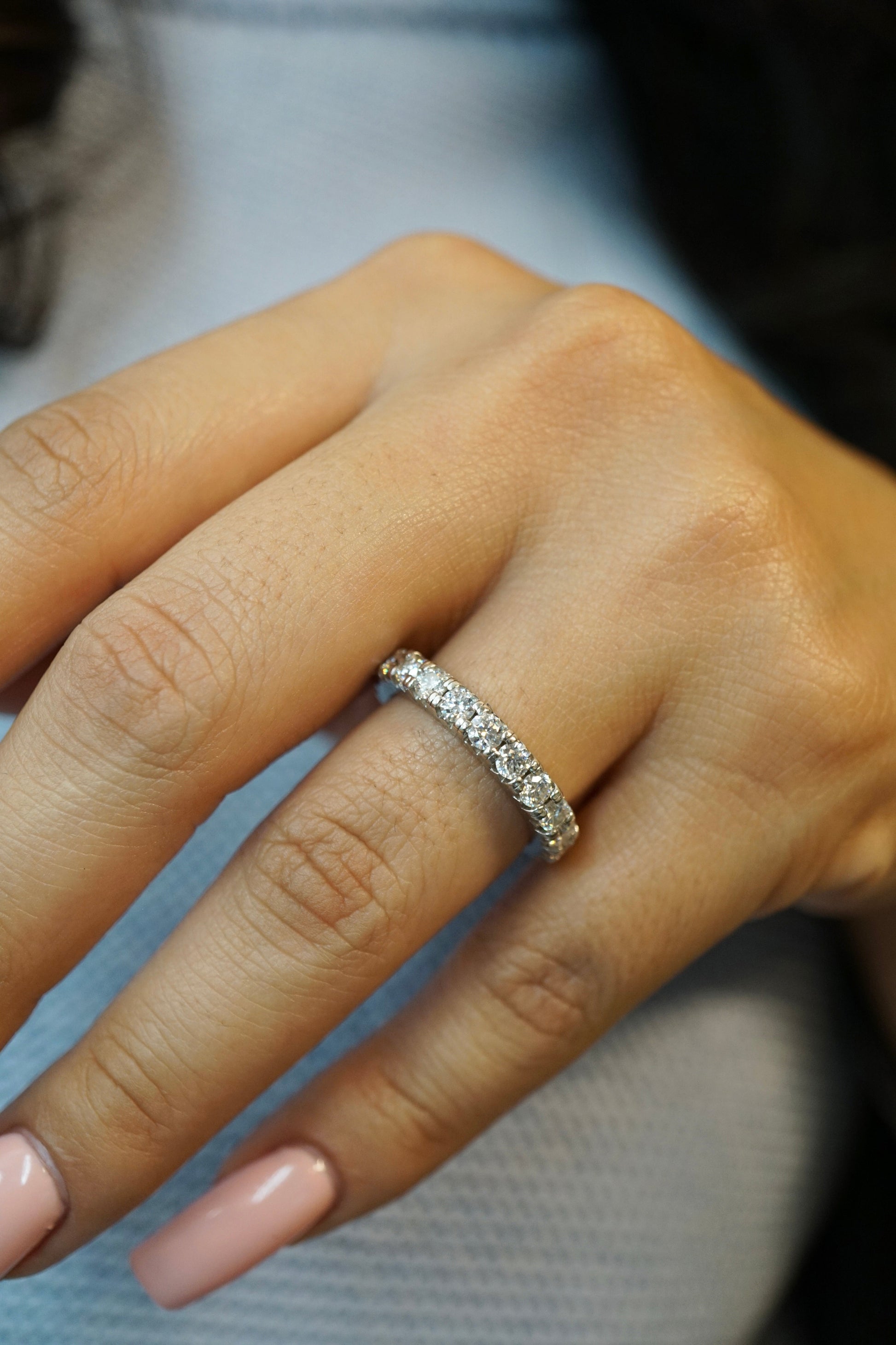 Elegant 3mm round cut moissanite eternity band with fishtail settings in 14K solid gold - elizabeth + Bern