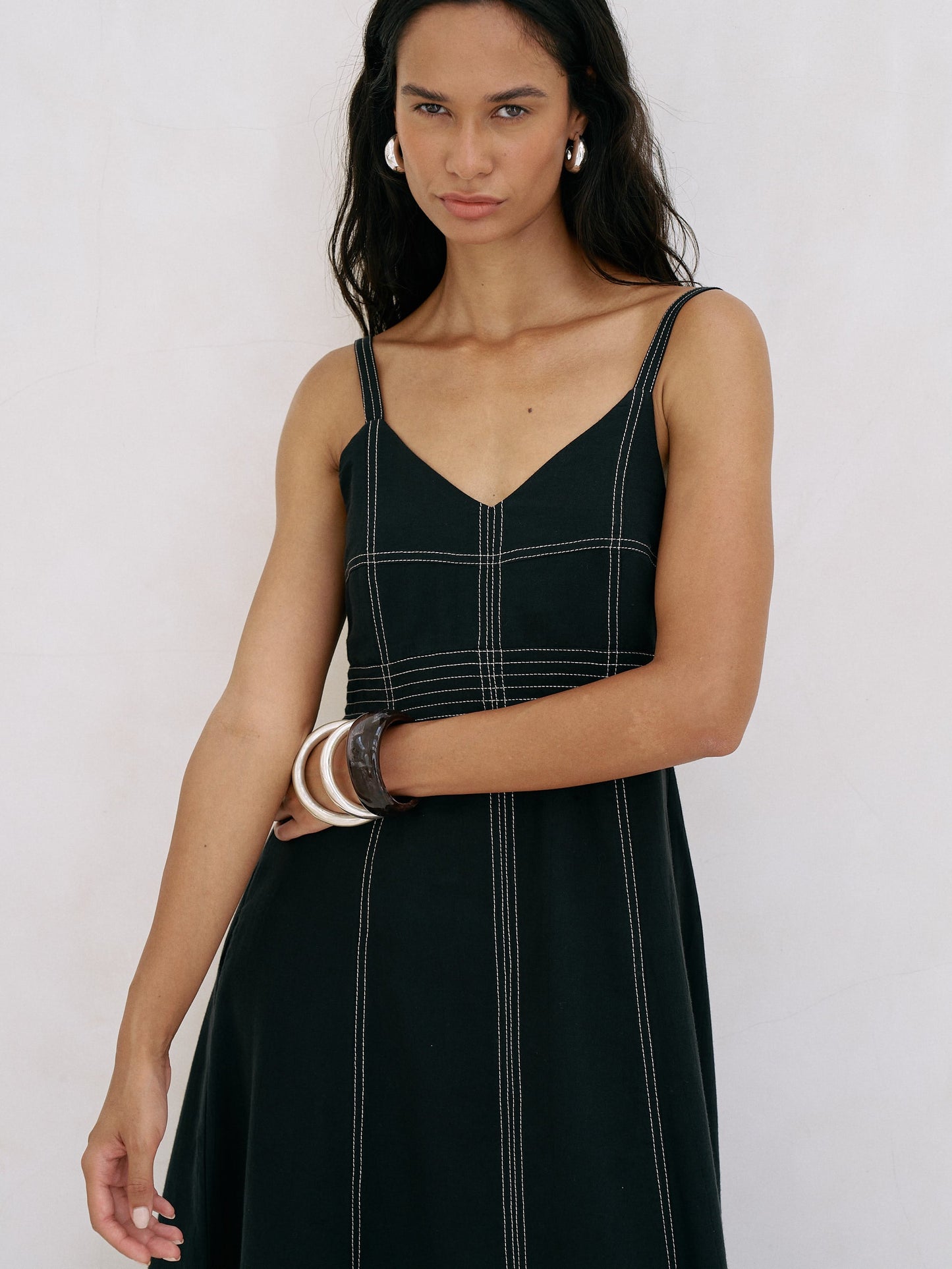 Eva maxi dress in black Turkish cotton with V-neckline, adjustable straps and hidden side pockets by The Handloom Eva Maxi Dress - Black - elizabeth + Bern