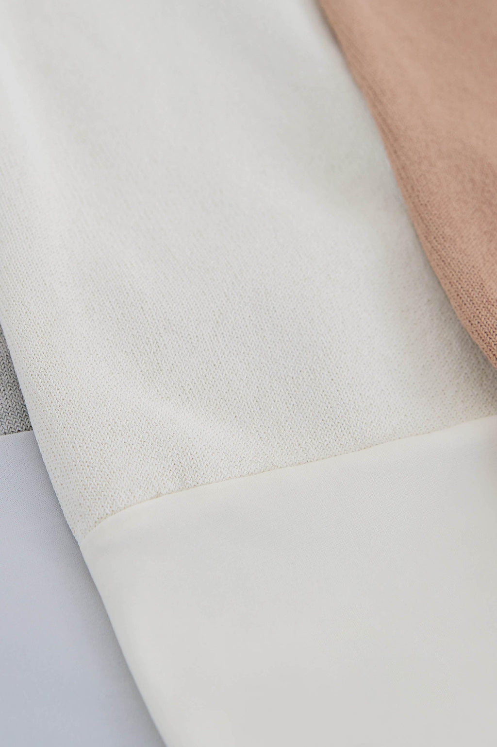 MIRA TURTLENECK VISCOSE BODYSUIT IN CREAM
