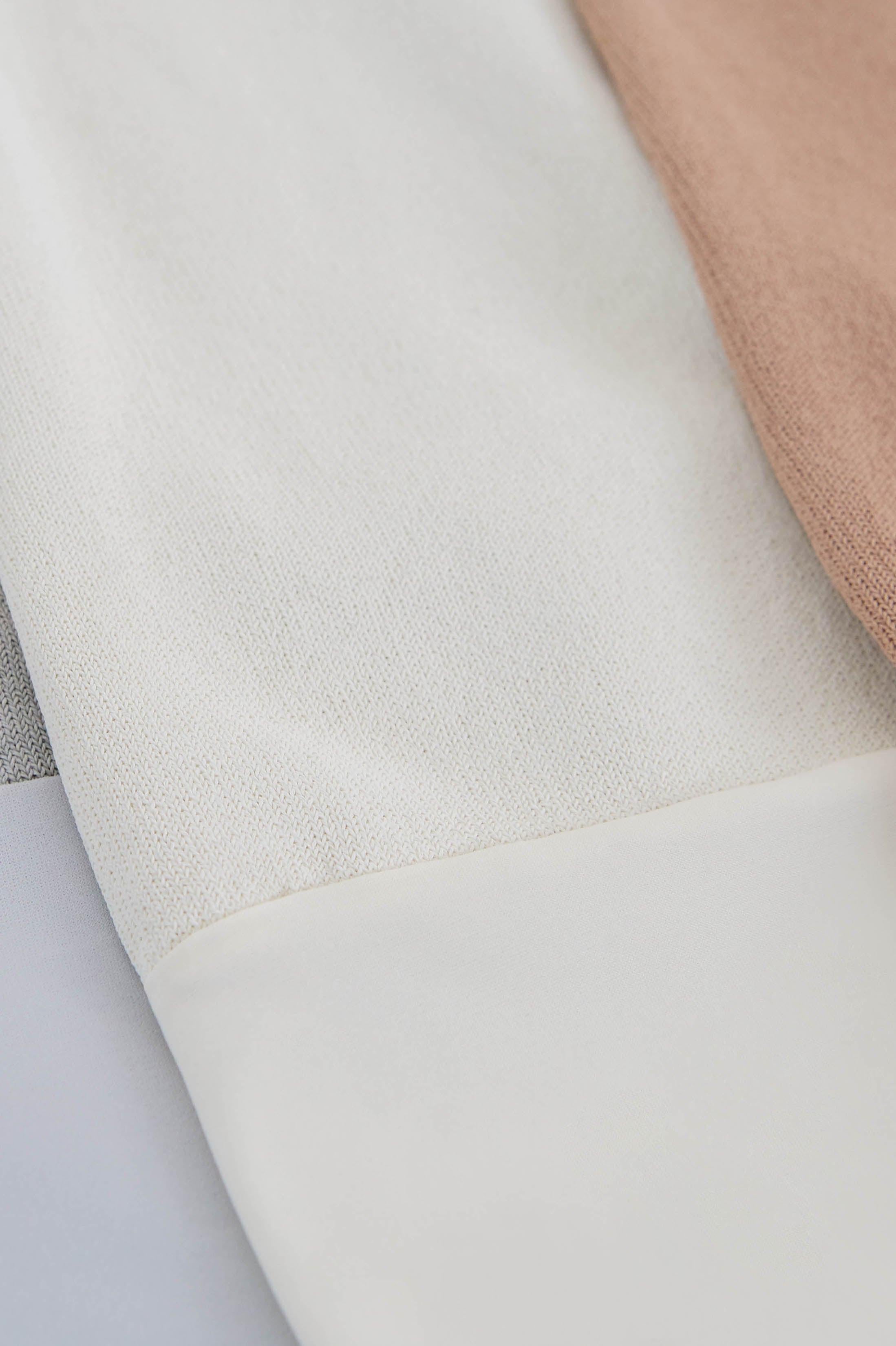 MIRA TURTLENECK VISCOSE BODYSUIT IN CREAM