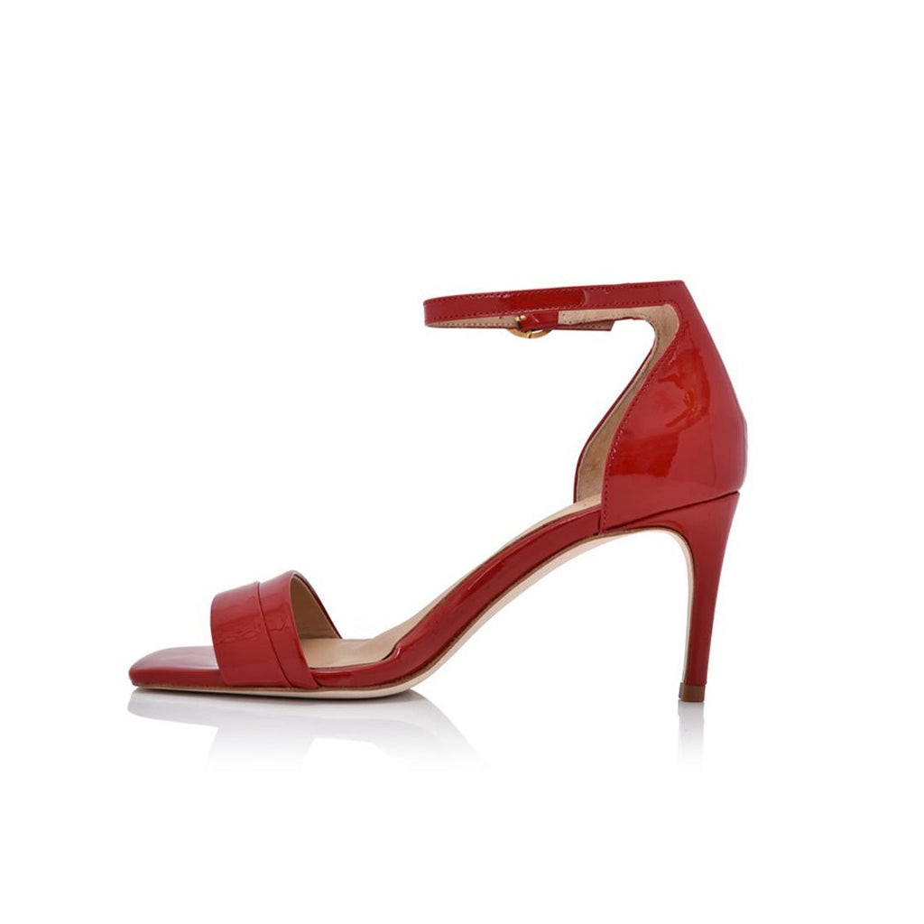 Red high-heeled shoe on a white background